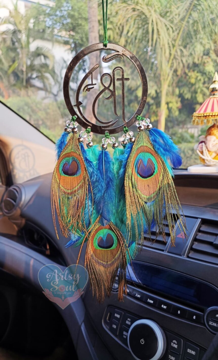 Ganesha's Guidance: Car Hanger with Peacock Feathers for Divine Drive